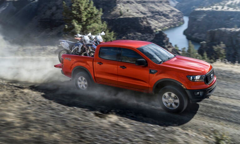 2022 Ford Ranger driving with bikes mounted in the back